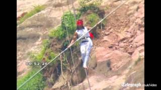 Chinese acrobat survives tightrope fall [upl. by Kampmann316]