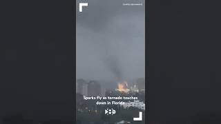 Sparks fly as tornado touches down in Florida [upl. by Ellerehs]