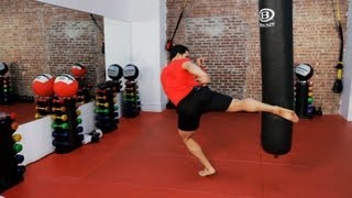 How to Do a Roundhouse Kick  Kickboxing Lessons [upl. by Duff]