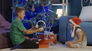 Kids Unwrapping Christmas Gifts At Home Stock Video [upl. by Broucek]