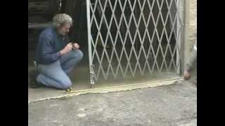 Folding Security Gate Installation Instructions [upl. by Thirzi856]