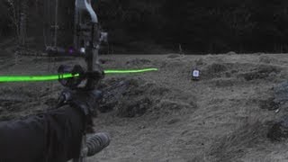 Shooting carbon arrows with lighted nocks from a compound bow [upl. by Doowron781]