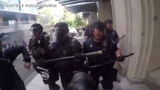 Portland riot police clear a street during dueling protests [upl. by Onaicul922]