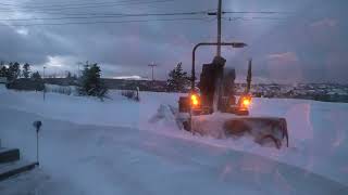 Kubota BX snow blowing driveway [upl. by Ettennig699]