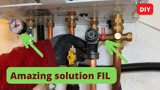 A Plumber shows how to connect a fillinginlet combination to a central heating boiler [upl. by Lippold633]