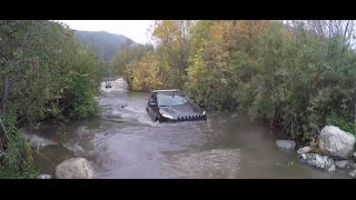 Jeep Cherokee Trailhawk Fording DEEP Water  3 FEET WININING  Obstacles [upl. by Nnairak821]