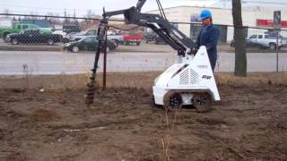 RAMROD Mini Skid Loader 575T  Drilling in Rocky Frozen Soil [upl. by Calore375]