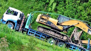 Steep Hill Road CAT 320D Excavator Transport By FAW Self Loader Truck Ketep Pass [upl. by Aborn668]