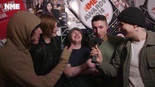 NME AWARDS 2016 Bring Me The Horizon Talk to NME After Trashing Coldplays Table [upl. by Laverna]