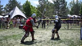 Medieval Knight breaks opponents helmet during full contact armored combat and knocks him down [upl. by Casper]