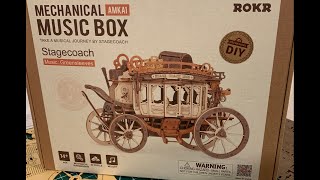 mmrutman is live building a ROKR 3d mechanical music box 1848 stagecoach [upl. by Suehtomit37]