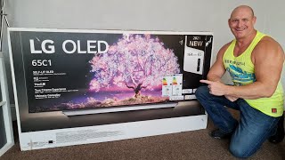 2021 65quot LG C1 OLED Unboxingwall mounting amp demo [upl. by Sigmund]