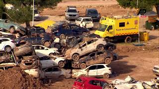 Catarroja residents search for their cars after DANA in improvised scrapyards [upl. by Neras]