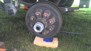 Greasing trailer wheels Part 1 [upl. by Natalya562]