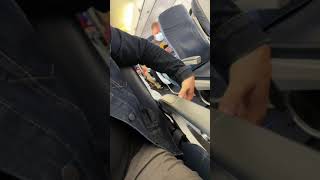 How To Get The Aisle Seat Armrest Up On An Airplane [upl. by Hermann395]