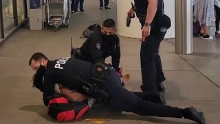 Aggressive panhandler harassing passengers Spitting at cops resisting arrest Tased by LAXPD [upl. by Natsud]