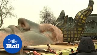 Statue of Libertys original torch moved to new museum home [upl. by Devinne319]