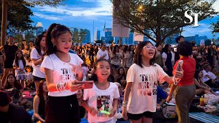 Taylor Swift in Singapore Fans outside the National Stadium sing along with the concert [upl. by Nerw]