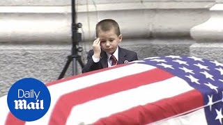 Heartbreaking moment boy salutes fallen airman dads coffin  Daily Mail [upl. by Heidie]