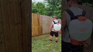 Washing wood fences with backpack sprayer [upl. by Belding]