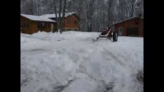 Farmall Super M plowing snow [upl. by Mcgee]