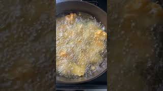 Frying chicken nuggets in cast iron [upl. by Ennairrek]