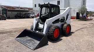 Minicargador Bobcat S850 2014 [upl. by Llekcor9]