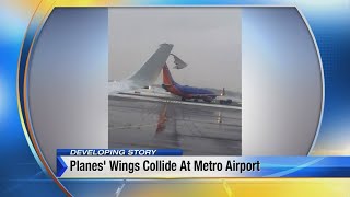 Planes wing tip sideswipes tail of other plane at DTW [upl. by Feriga]