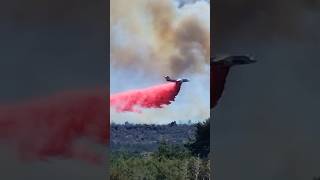 🛩 Dropping PhosChek on the Bridge Fire wildfire californiawildfires dc10 [upl. by Ahsinuq]