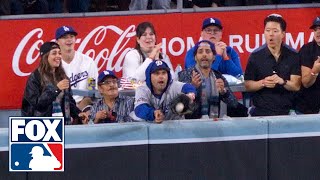 Fan interferes at World Series and reaches for ball at the wall in Yankees vs Dodgers [upl. by Adnarrim]