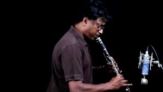 En Mel Vizhuntha Mazhai Thuliye  Clarinet amp Flute Cover [upl. by Jammin]