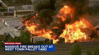 Chicago fire crews battle massive blaze at West Town pallet yard hazmat situation declared [upl. by Eckblad]