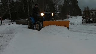 Snowplowing frozen snow Iseki TX 2140 4 WD🚜 [upl. by Wilkens584]