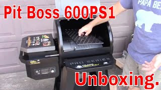 Pit Boss 600PS1 Unboxing and assembly Smoker grill [upl. by Anairuy563]