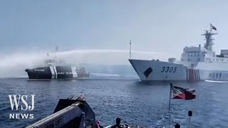 Chinese Coast Guard Blasts Philippine Boats With Water Cannons  WSJ News [upl. by Aidnac]