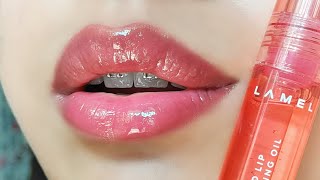 LAMEL All in One Tinted Lip Plumping Oil 401 Peachy  Lip Swatch Video [upl. by Alimat]