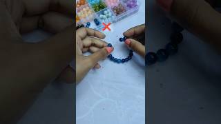 How to Tie Elastic Bracelet 💯😍 hack easy diy bracelet shorts beads jewellery craft knot [upl. by Ekram]