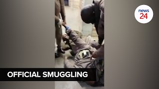 WATCH  Prison guard allegedly caught with contraband strapped to his body in Kimberley prison [upl. by Yreneh359]