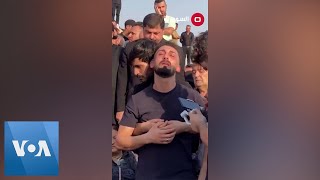 Groom and Relatives Mourn Victims of Iraq Wedding Hall Fire  VOA News [upl. by Nipsirc563]