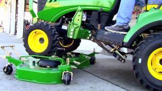 HowTo Install and Remove a John Deere 60D Drive Over Mower Deck [upl. by Neeuq]