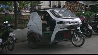 Philippines Palawan tricycle ride from Immaculate Conception Cathedral to Puerto Princesa Baywalk [upl. by Claudianus239]