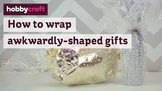 How To Wrap AwkwardlyShaped Gifts  Gift Wrapping  Hobbycraft [upl. by Lehte]