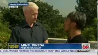 Journeys Arnel Pineda helps typhoon Haiyan Victims  Anderson Cooper [upl. by Rockefeller]