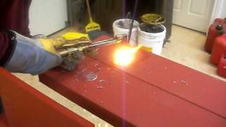 Cutting oxyacetylene holes in C channel frames for DOM tube [upl. by Nirb]