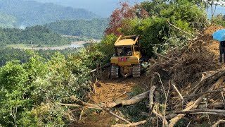 Its a very stressful job CAT D6R XL bulldozer digs hard ground in the mountain to make a terrace [upl. by Gabie740]