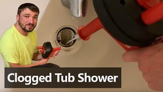 Unclogging a Slow Tub Shower Drain [upl. by Nnaycnan]