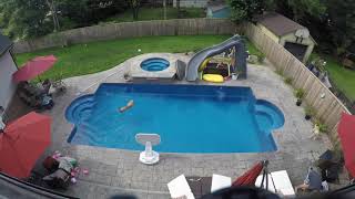 Fiberglass pool install timelapse part 3  vacuuming and swimming dog [upl. by Halludba]