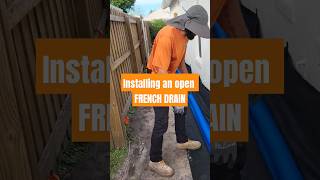 Installing an open French drain Double pipe system in Orlando Fl frenchdrain [upl. by Nnaeus]