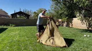 Fast and easy folding of tarp shelter [upl. by Annaiek]