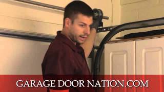 How to Fix A Crooked Garage Door [upl. by Rahas]